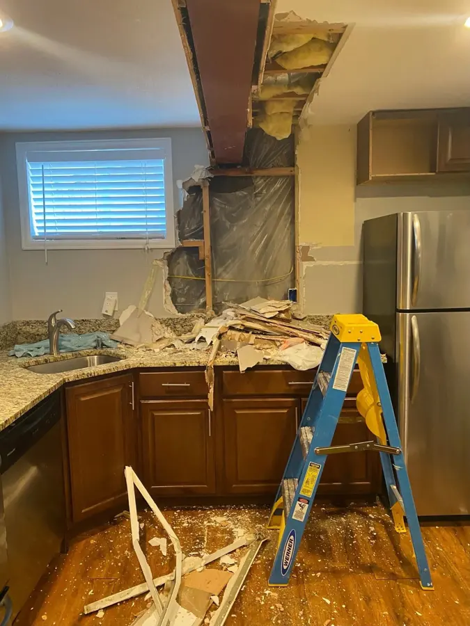 Appliance supply line leak flooding a laundry room in a Stamford, CT home